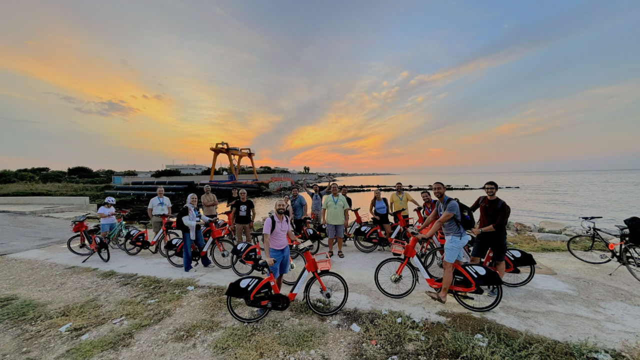 Cyclists near the sea